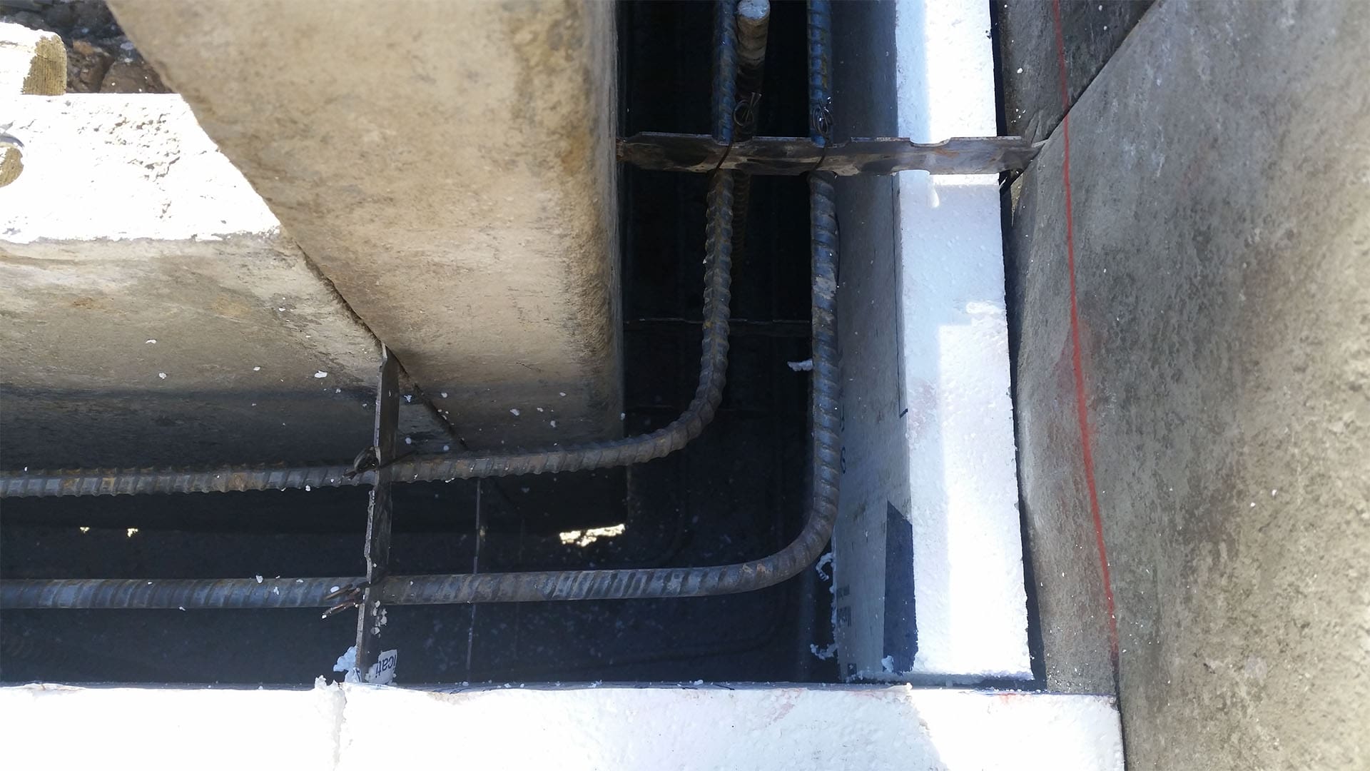 Crawl space foundation excavation and concrete footings for home addition in Denver