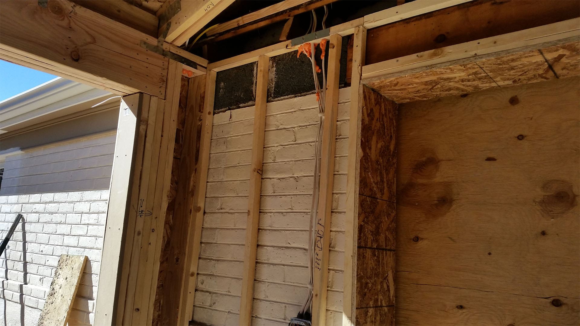 Framing walls and roof for Denver home addition at Raleigh Street