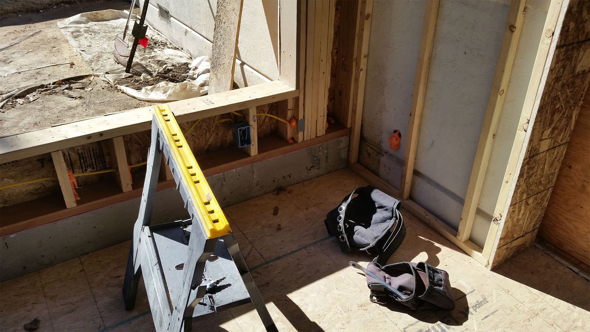 Framing walls and roof for Denver home addition at Raleigh Street