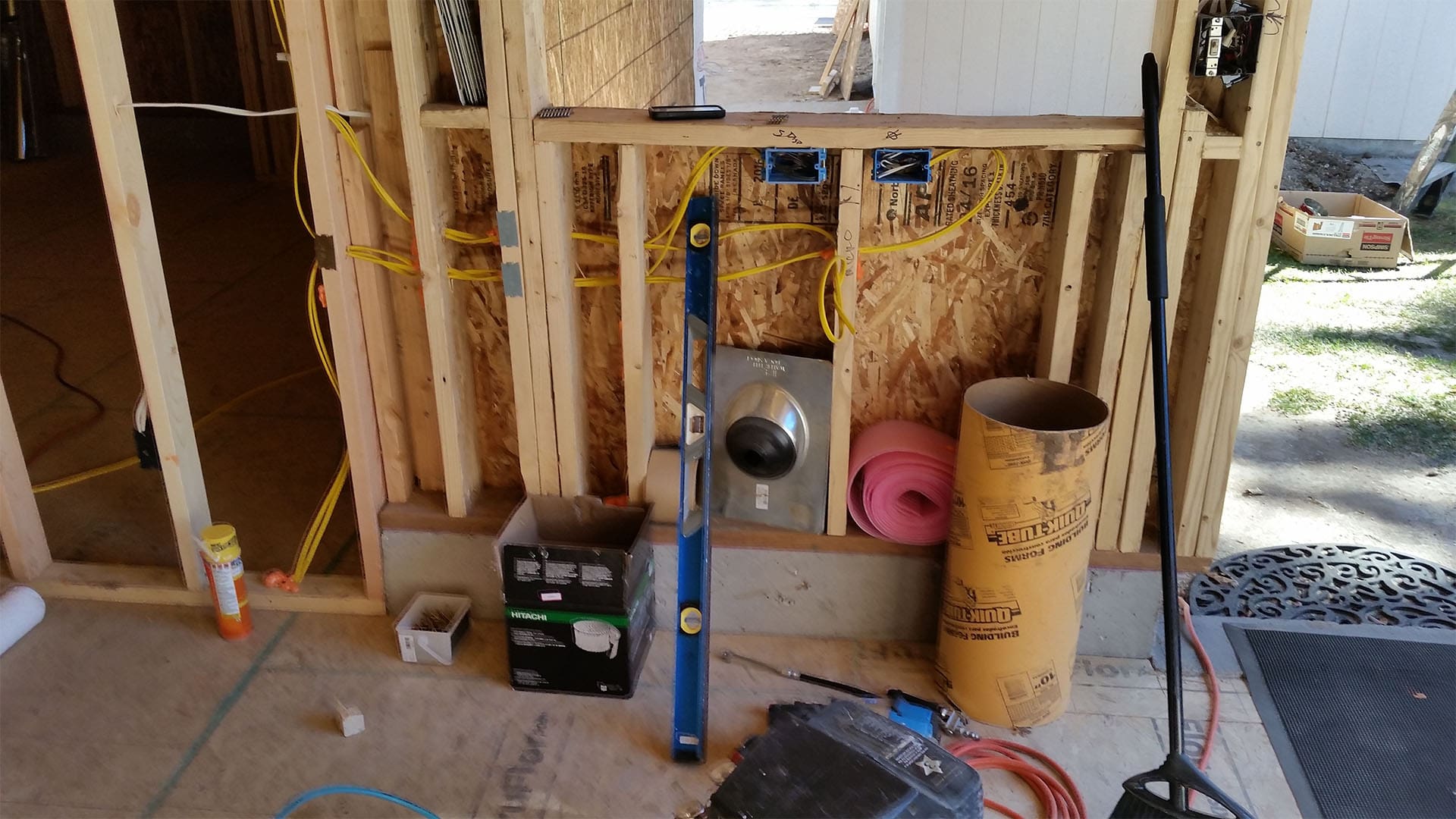 Framing walls and roof for Denver home addition at Raleigh Street