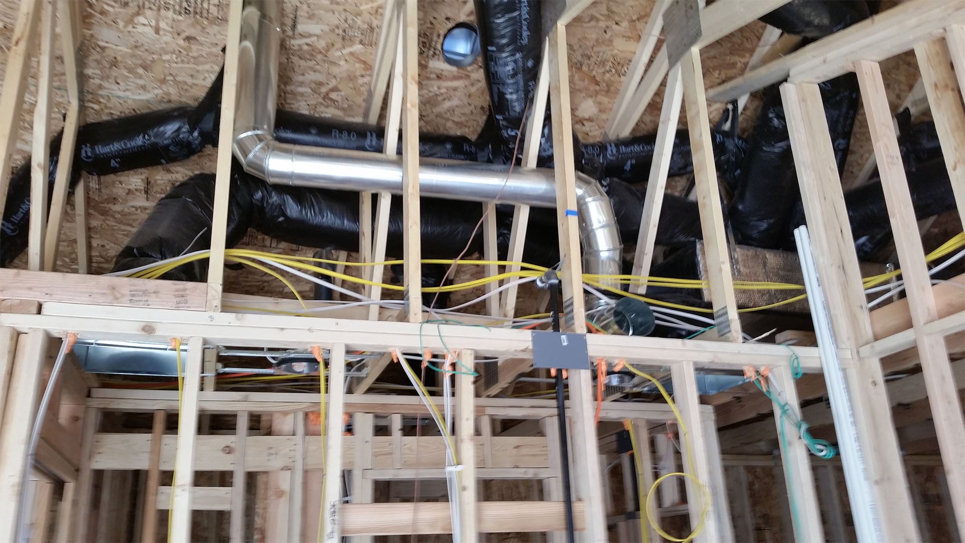 Framing walls and roof for Denver home addition at Raleigh Street