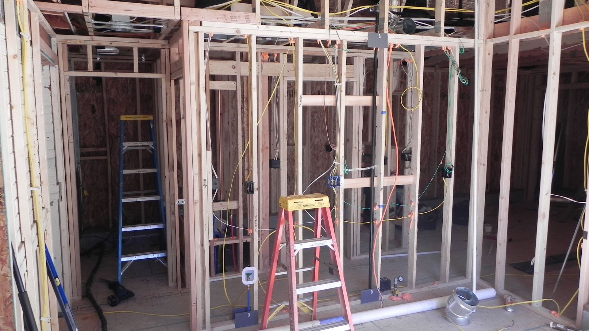 Framing walls and roof for Denver home addition at Raleigh Street